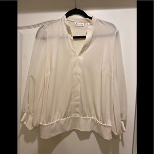Sheer white woman’s blouse